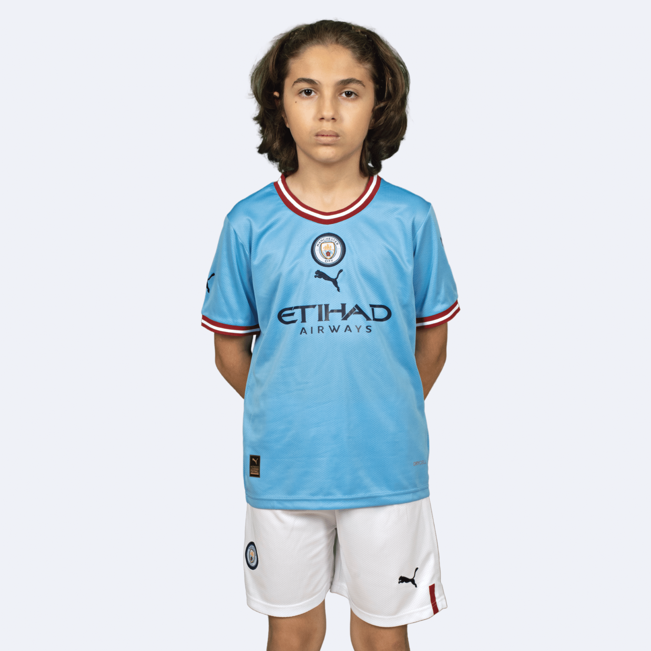 Boys man city shirt sales
